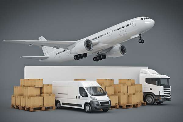 An image of boxes, a van, a large truck and a plane